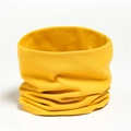 Close-up of soft ginger yellow knitted cotton neck warmer with fine ribbed texture - Bright Yellow