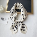 Elegant 70cm silk-like square scarf with black geometric patterns on cream background - 70x70cm / Off White