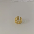 Detail of gold-plated multi-layer crossover ring featuring twisted rope textures - Bright Gold
