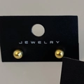 Close-up of minimalist golden spherical stud earrings with polished mirror finish on black card - Gold 6mm (Real Gold Plated)