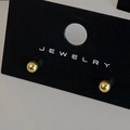 Detailed view of minimalist gold sphere stud earrings on a professional black jewelry card - Gold 4mm (Real Gold Plated)