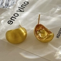 Detailed view of matte brushed gold bean stud earrings with polished inner surface - Brushed Gold Bean (Gold Plated)