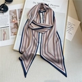 Artistic layout of champagne gold striped twilly silk scarf on a magazine background - Champagne Stripe Pattern (LE-41)