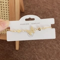 Bracelet papillon doré élégant avec zircons et chaîne coulissante ajustable - Bracelet papillon doré
