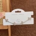 Elegante bracciale a quadrifoglio in argento con cristalli su cartoncino per gioielli - Argento