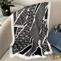 Detailed view of large silk scarf with geometric H pattern on a gray sofa - 180*90CM / White Border (XL5-2)