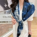 Elegant navy and white tie-dye silk scarf paired with a stylish white trench coat - Blue White Ink Tie-dye (FE48-1)