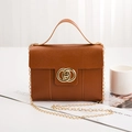 Caramel brown lizard texture flap crossbody bag with golden double ring lock closure - Brown