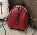 Mini zaino rosso da donna in pelle PU con doppie cerniere a nappa lunga e manico - Rosso