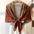 Silk-like scarf with leopard and paisley prints tied over a gray turtleneck sweater - Leopard Patchwork Paisley (FE142-1)