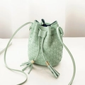 Chic mint green bucket bag with floral embossing and decorative tassel drawstrings - Green