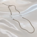 Detail of silver flat snake bone chain with lobster clasp and adjustable link extension - Silver Short Flat Herringbone Necklace