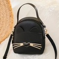 Schwarzer Mini-Katzenrucksack aus Kunstleder mit goldenen Schnurrhaaren und Ohren - Schwarz