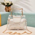 Durchsichtige Handtasche mit Gänseblümchen-Print, Goldgriffen und weißer Innentasche - Weiß