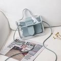 Mini borsa trasparente in PVC con finiture in pelle azzurra e bustina interna - Verde