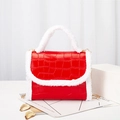Red crocodile pattern handbag with white faux fur trim and gold metal chain strap - Red