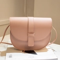 Pink PU leather saddle bag with smooth finish and vertical strap magnetic closure - Pink