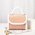 Pink crocodile embossed mini handbag with plush white fur trim and gold chain strap - Pink