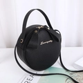 Cute black round crossbody bag with litchi grain texture and gold Sunnycity logo - Black