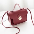 Retro wine red mini square bag with gold metal lock and top handle for crossbody wear - Red