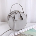 Light grey round crossbody bag with lychee texture PU leather and gold logo - Gray
