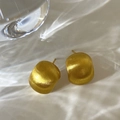 Macro detail of brushed gold earrings with matte finish on water ripple background - Western Brushed Gold Style (A-393)