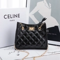 Elegant black quilted shoulder bag with gold chain strap and metallic twist lock - Black