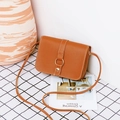 Crossbody brown leather square bag with golden ring buckle and contrast white stitching - Brown