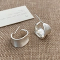Macro shot of S925 sterling silver stamp on vintage silver-plated C-shaped chunky earrings - Silver Irregular C-Shape Style