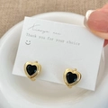 Detailed view of French vintage heart earrings with black zircon and golden huggie hoops - Gold Black Zirconia