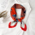 Close-up of vintage carriage print silk scarf with orange and navy geometric patterns - 70x70cm / Red (FJ414-1)