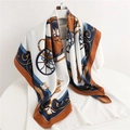 Classic carriage print twill silk scarf in navy and caramel displayed on white shirt - 90x90cm / Coffee