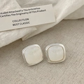 Macro view of geometric square earrings with silver finish and white mother of pearl inlay - Silver Square