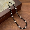 Retro beaded necklace featuring black faceted beads, baroque pearls, and gold accents - Black Crystal Baroque Pearl Necklace