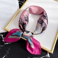 Detail of silk scarf with pink palm tree patterns and geometric polka dot accents - 70x70cm / Rose Red Border
