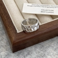 Detail shot of silver double-row heart ring with zircon inlay on a velvet tray - Silver