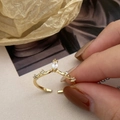 Detail of gold crown ring with marquise zircon and side diamonds on vintage background - Gold Marquise Crown Style (Small)