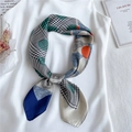 Silk-feel neck scarf featuring houndstooth, paisley, and polka dot patterns in vibrant colors - Navy Blue with Khaki Border