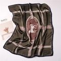 Detailed view of olive green silk scarf featuring horse and belt patterns with Roma print - 70x70cm / Army Green