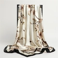 Silk feel scarf with elegant magnolia floral pattern and black contrast border trim - Beige Black Edge