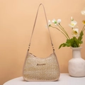 Chic straw woven underarm bag with light apricot leather strap and gold logo detail - Apricot