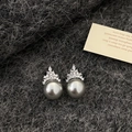 Elegant grey pearl crown earrings with micro-set zircon accents on a textured background - Crown Pearl Stud Earrings / Silver/Gray