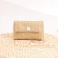 Straw crossbody bag with daisy flower and pearl accents on elegant gold chain strap - Yellow