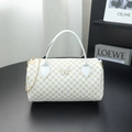 White Boston bag with yellow geometric print and enamel butterfly charm on chain - White