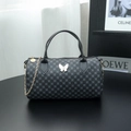 Black polka dot Boston bag with silver butterfly buckle and gold chain strap - Black