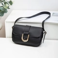 Chic black underarm bag with lychee texture and gold horseshoe buckle detail - Black