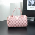 Pink cylinder boston bag with red circular patterns and 3D white butterfly charm - Pink
