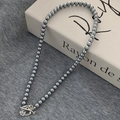 Detail of dark grey pearl necklace featuring a vintage engraved silver OT toggle clasp - Grey High Gloss Pearl Vintage T Buckle Necklace B-332