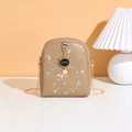 Beige crossbody bag with delicate floral embroidery and gold chain strap decoration - Apricot