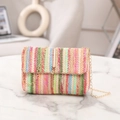 Rainbow woven crossbody bag with golden chain strap and tassel detail on marble surface - Multicolor Vertical Stripe (Style 8)